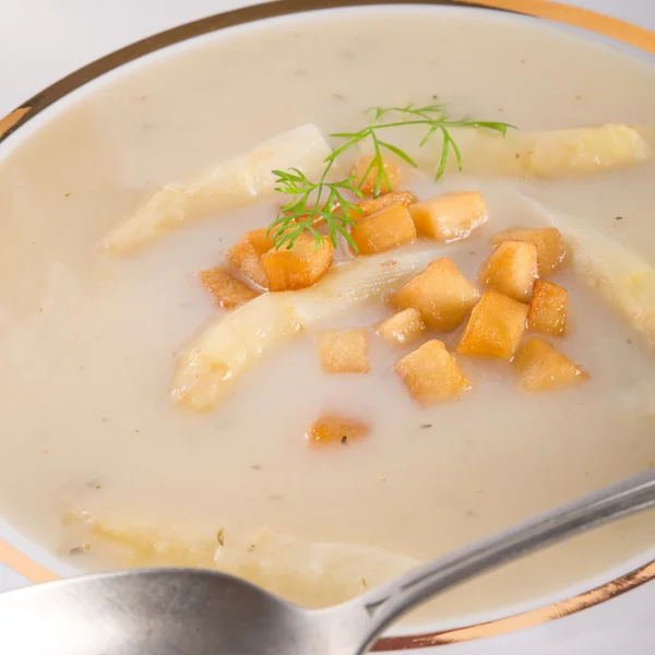 Asparagus Soup with Apple cubes — Stock Photo, Image