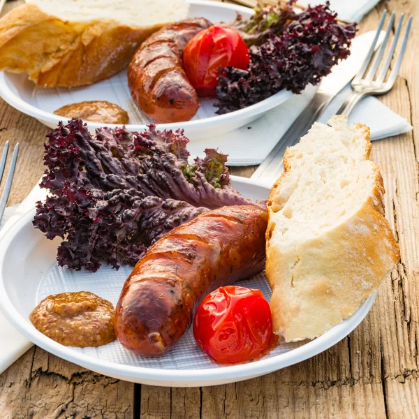 Grilled sausages outdoors — Stock Photo, Image