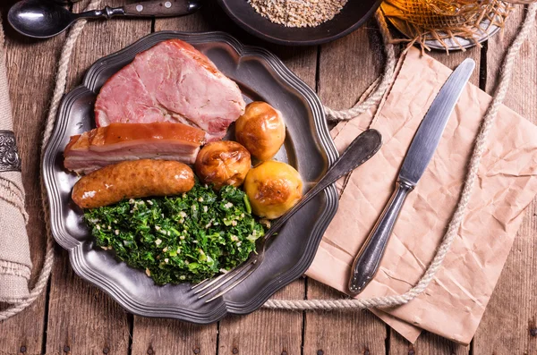 Grilled meat with kale — Stock Image Grilled meat with kale Stock Photo