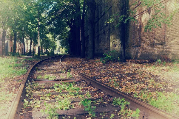 Vecchia ferrovia in città — Foto Stock