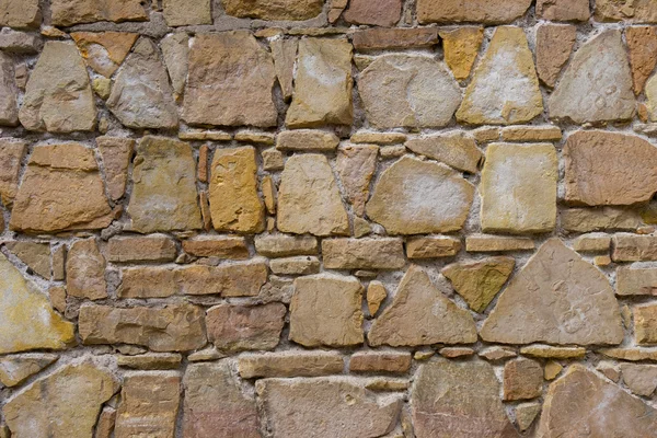 Casa pared de piedras de diferentes formas — Foto de Stock