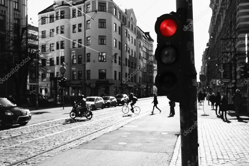 Crossroads with traffic lights red in the modern city in the spr