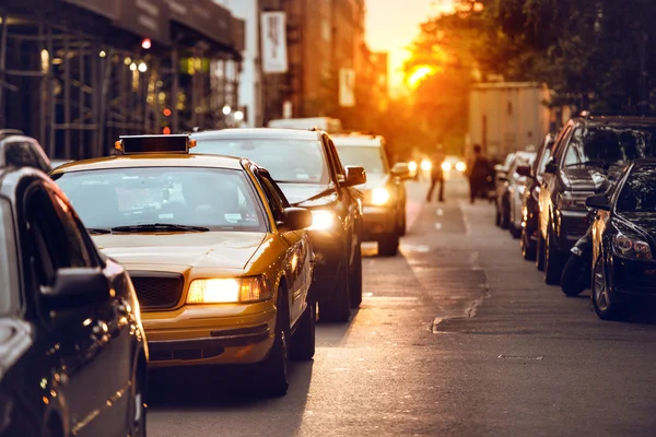 Car traffic on New York City street at sunset time — Stock Photo, Image