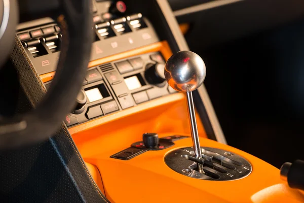 Closeup photo of sport car 6 speed manual gearstick — Stock Photo, Image