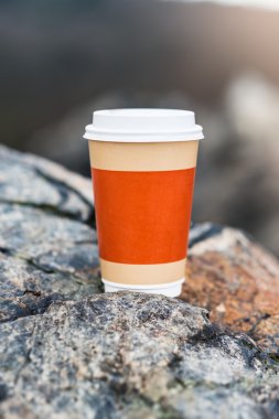 Coffee cup on natural background clipart