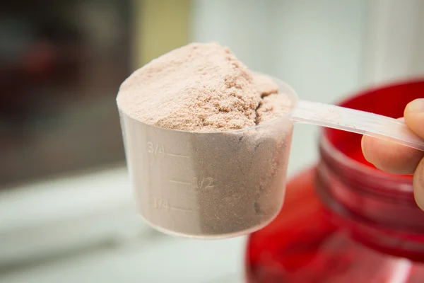 Una cucharada de proteína de suero. Nutrición deportiva . —  Fotos de Stock