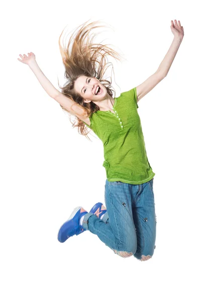Ευτυχισμένος νεαρή γυναίκα άλμα στον αέρα ενάντια λευκό αμουδερές — Φωτογραφία Αρχείου