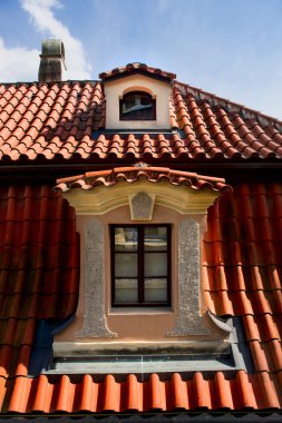 Windows on orange roofs in Prague, Czech Republic
