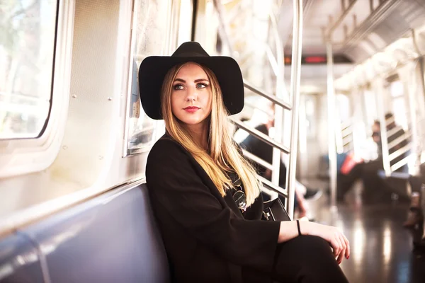 Elegant fashion business woman in the metro — Stock Photo, Image