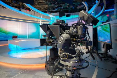 TV NEWS cast studio with camera and light clipart