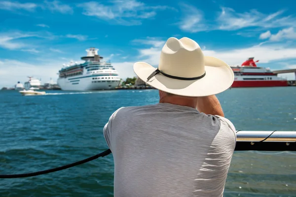 senior man going back to cruise ship after island tour
