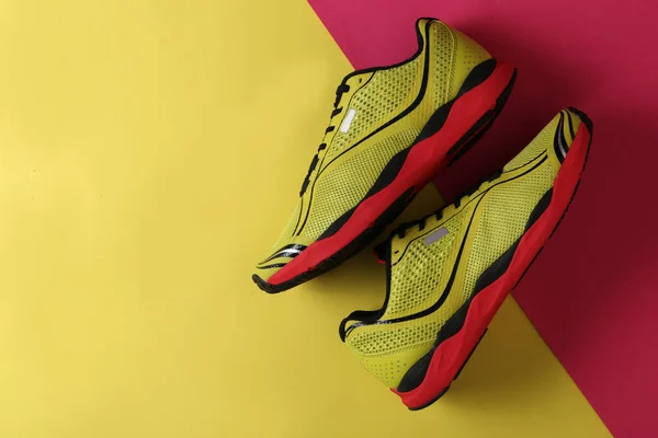 Top View Sport Shoes Red Yellow Background Copy Space Right — 스톡 사진