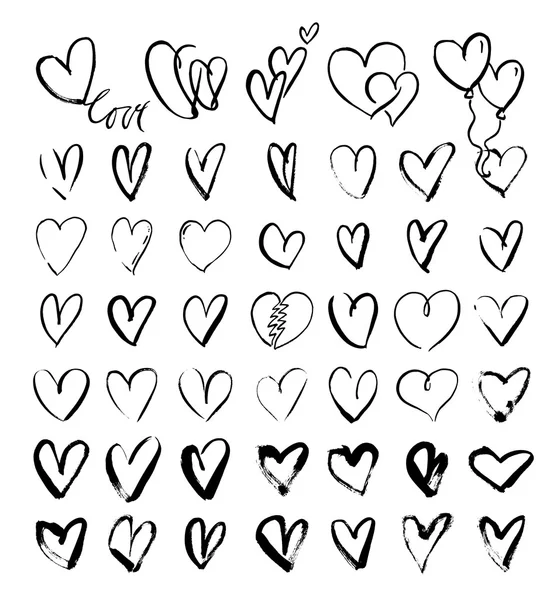 Coeurs grunge dessinés à la main — Image vectorielle