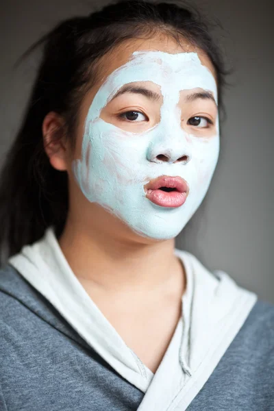 girl with a self made beauty mask