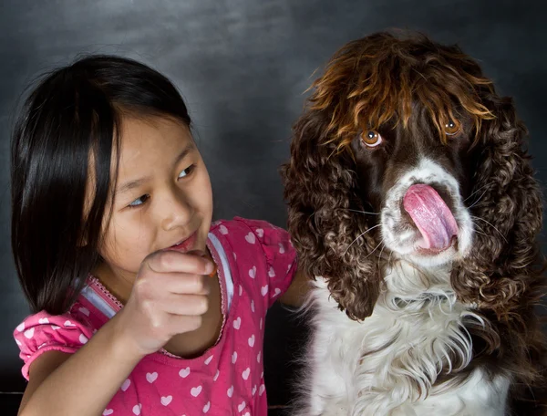 Cute girl with dog — Stock Photo, Image