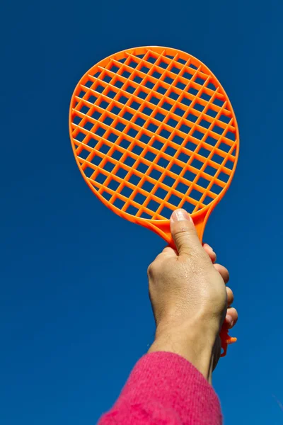 One orange racquet — Stock Photo, Image