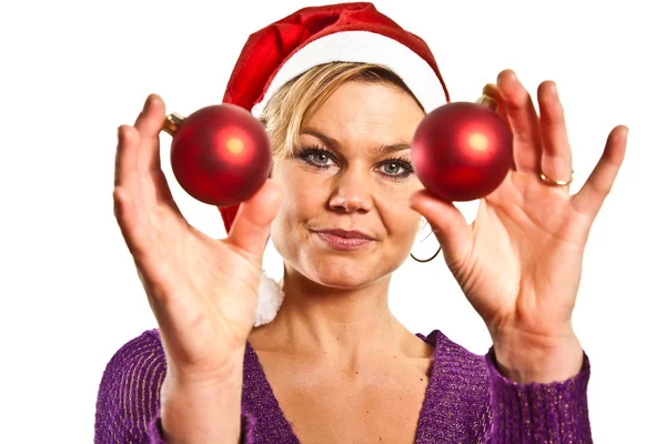 Chica sosteniendo bolas de Navidad —  Fotos de Stock