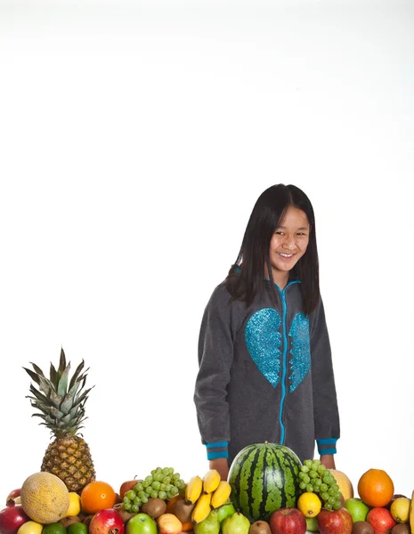 Tropic fruits and girl — Stock Photo, Image