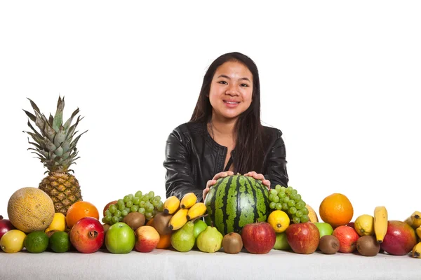 Asian girl with fruits — Stock Photo, Image