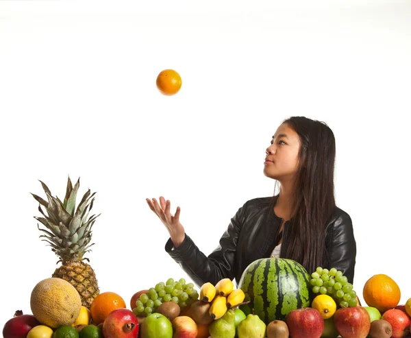 Asian girl with fruits — Stock Photo, Image