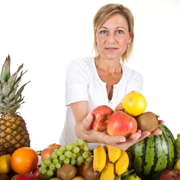 Mujer rubia con frutas —  Fotos de Stock