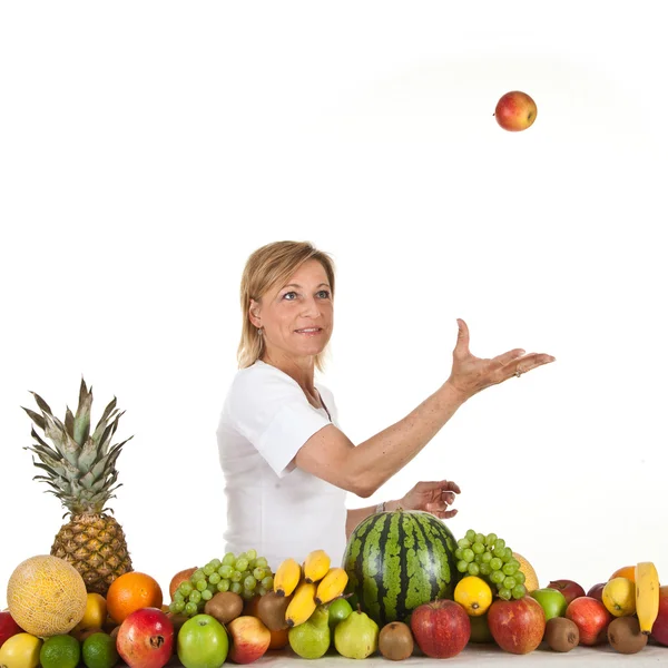 Mujer rubia con frutas —  Fotos de Stock