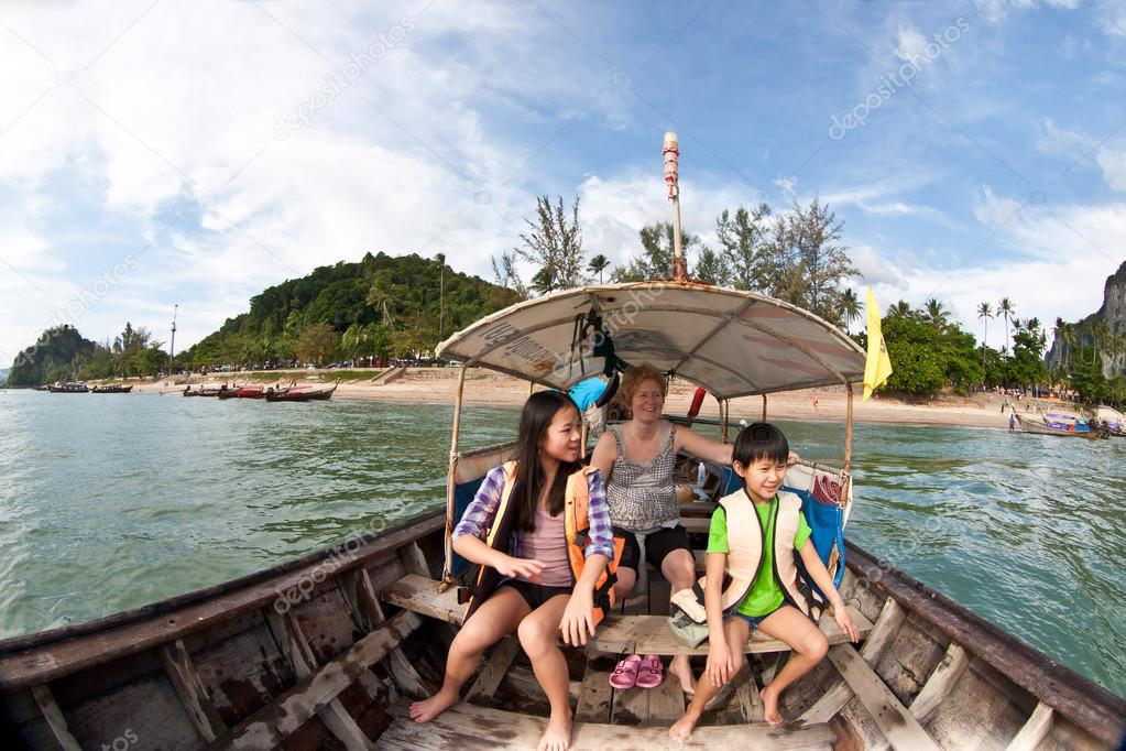 Family on Long tail boat