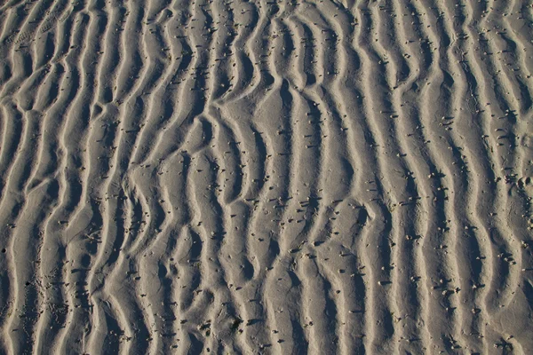 Sandmuster am Strand — Stockfoto