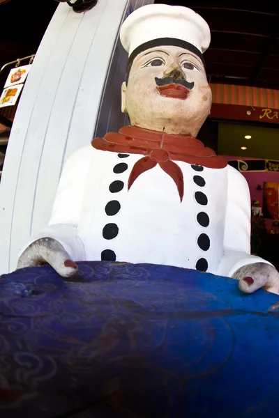 Statue of a chef at the entrance — Stock Photo, Image