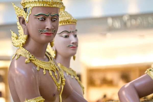 Statues in Bangkok airport — Stock Photo, Image