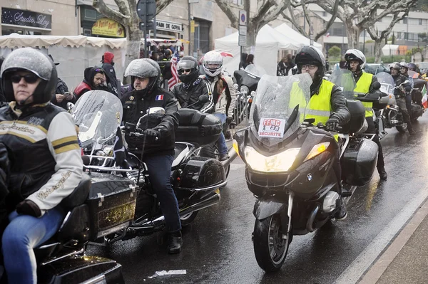 Bikers driving in heavy rain