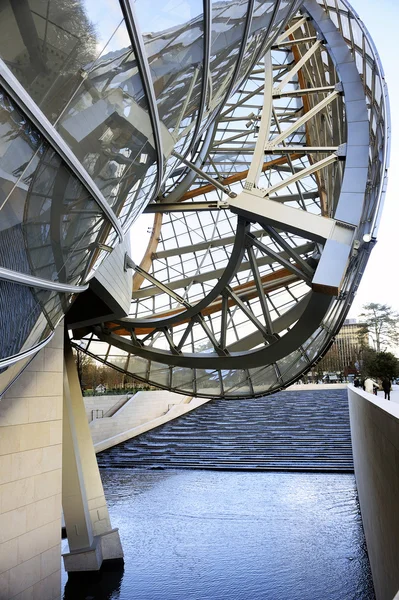 Museum Of Contemporary Art Of The Louis Vuitton Foundation Created By The  American Architect Frank Gehry, The Building Is Located Porte Maillot At  The Entrance Of The Bois De Boulogne. Stock Photo