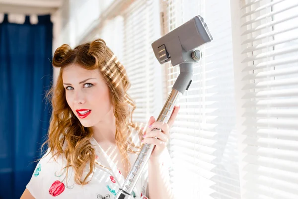 Woman holding dust removal vacuum cleaner — Stock Photo, Image