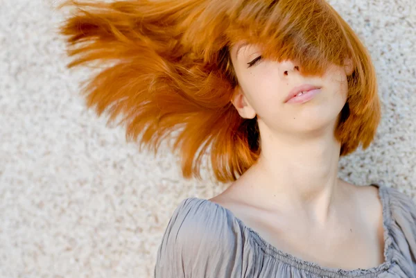 Girl having fun enjoying wind blow — Stock Photo, Image