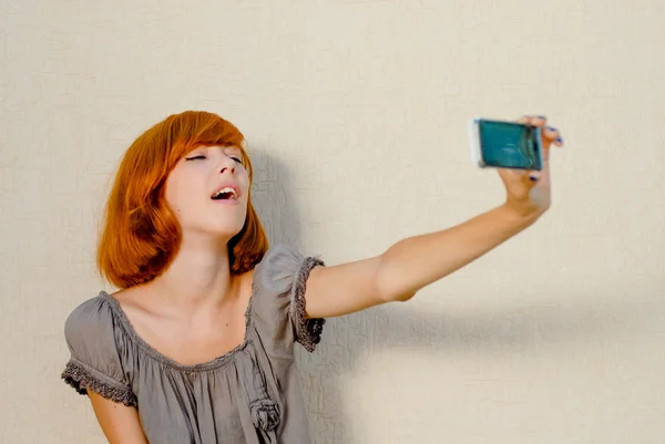 Woman taking picture of herself — Stock Photo, Image