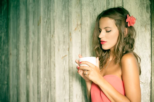 Girl drinking cup hot drink — Stock Photo, Image