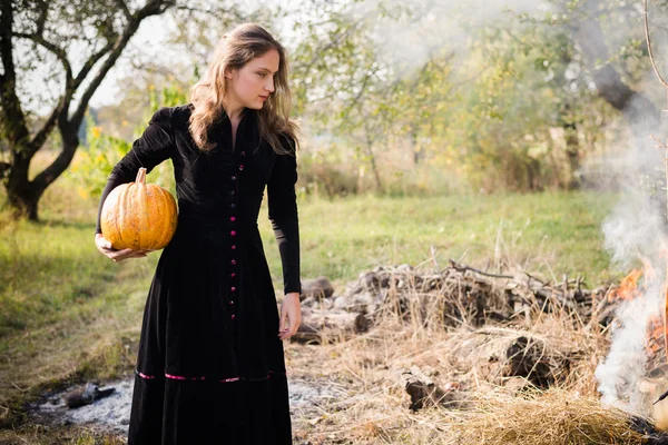 Girl with pumpkin — Stock Photo, Image