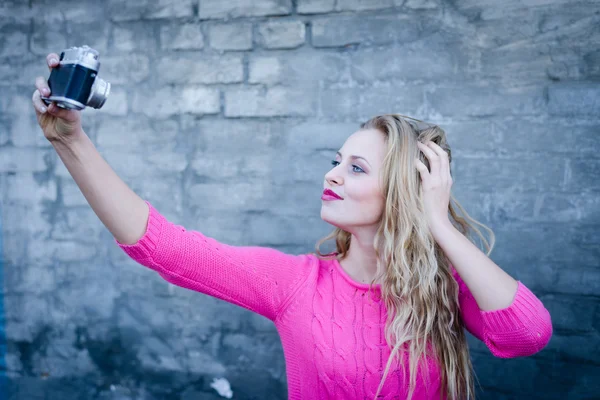 Woman with retro photo camera — Stock Photo, Image