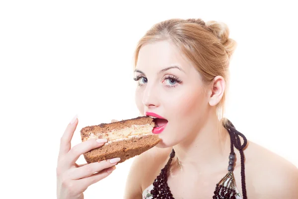 Woman eating piece of chocolate cake Stock Image