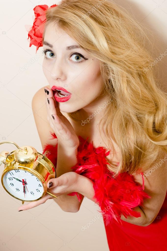 Pinup woman with alarm-clock