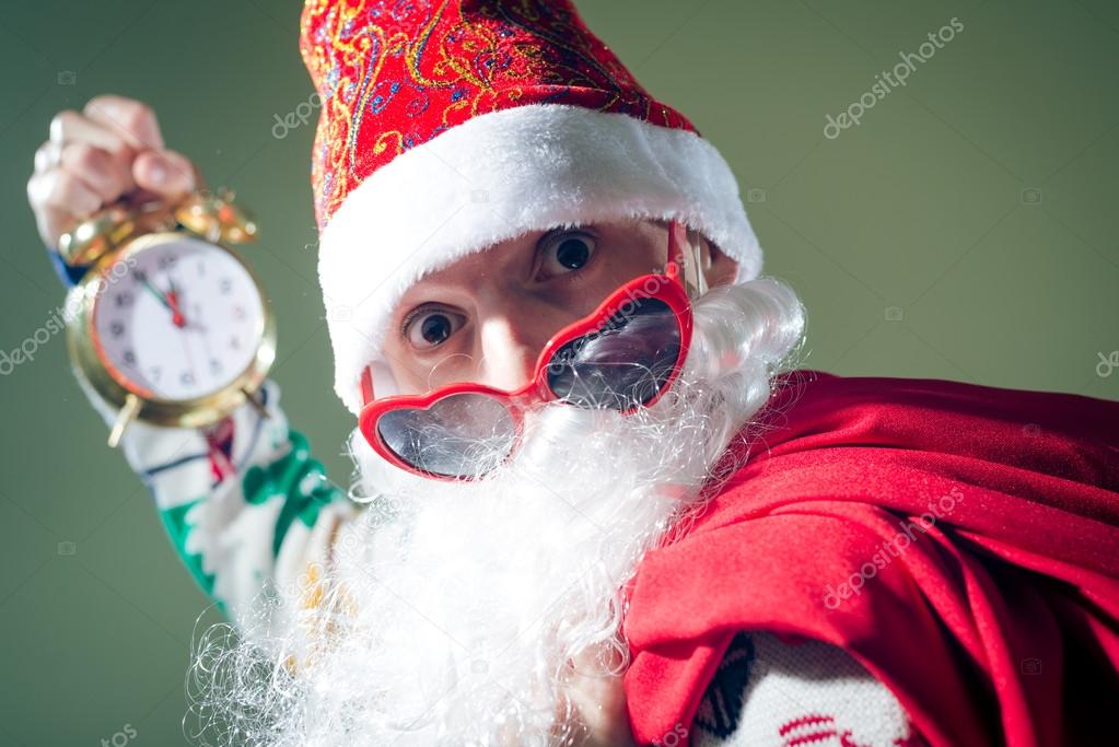 Santa holding clock