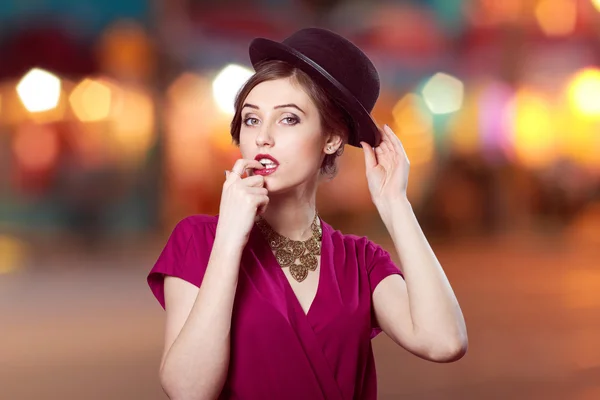 Young woman in red hat — Stock Photo, Image