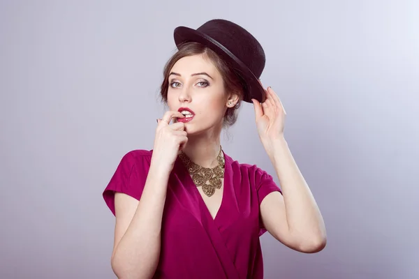 Young woman in red hat — Stock Photo, Image