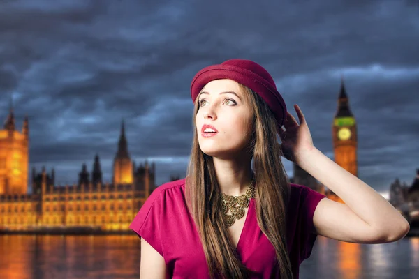 Woman over night London background — Stock Photo, Image
