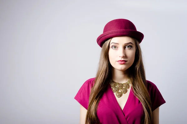 Beautiful woman in red hat — Stock Photo, Image