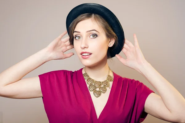 Young woman in hat — Stock Photo, Image