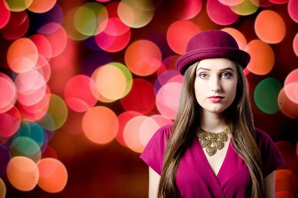 Young woman in red hat — Stock Photo, Image