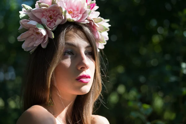 Pretty woman with flowers — Stock Photo, Image