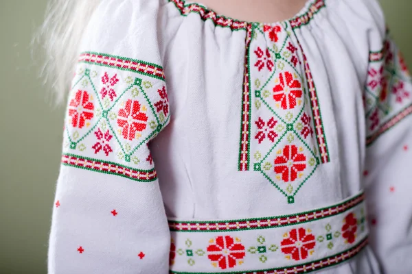 Girl in handmade embroidered clothes with handbag — Stock Photo, Image