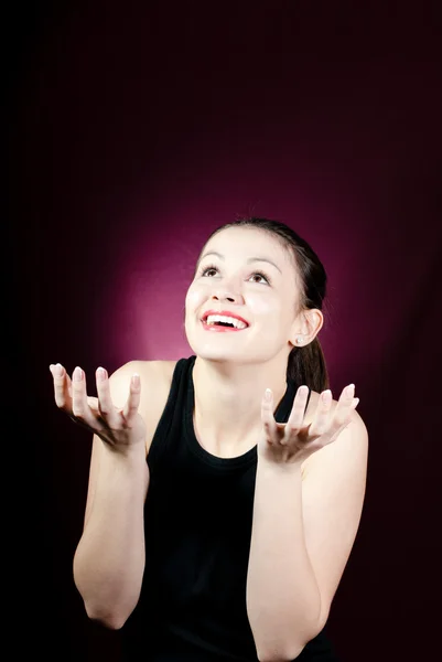 Young excited woman looking up — Stock Photo, Image